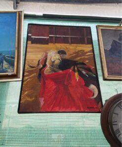 Óleo taurino firmado , escena de faena con capote en plaza de toros.