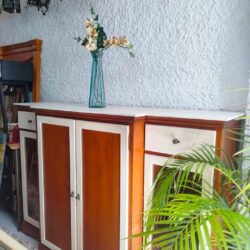 Tall wooden sideboard with doors and drawer. 200 × 60 × 135 cm.