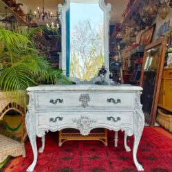 Vintage dresser and mirror set in aged white.