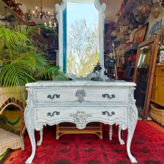 Vintage dresser and mirror set in aged white.