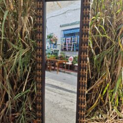 Natural rattan mirror, 180×60 cm. Large format artisanal design, ideal for interiors with a warm and organic style.