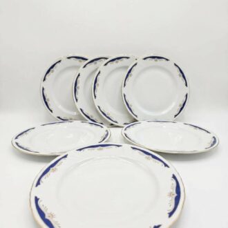 Inicio 19 Platos de porcelana Crown Regal azul y oro