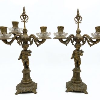 Bronze and crystal candelabras with antique cherubs